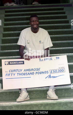 CURTLEY AMBROSE WITH CHEQUE Stock Photo