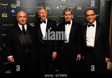 (left to right) Sir Philip Green, Harold Tilman, Stuart Rose and Theo Paphitis arrive at the Retail Trust London Ball at the Grosvenor House Hotel in London. Stock Photo