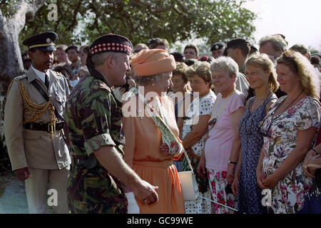 Queen Elizabeth II meets local people during the first day of her visit to Belize in the Caribbean. Stock Photo