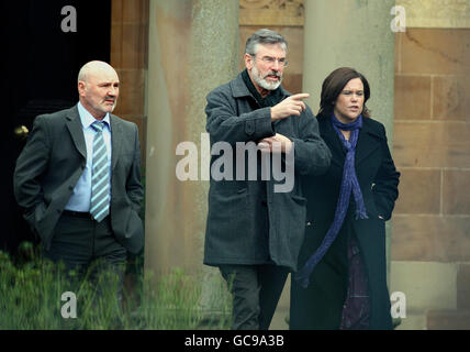 Sinn Fein President Gerry Adams with Alex Maskey (left) and Mary Lou McDonald, leave Hillsborough Castle, Belfast as talks continue between the political parties on Northern Ireland's power-sharing deal. Stock Photo