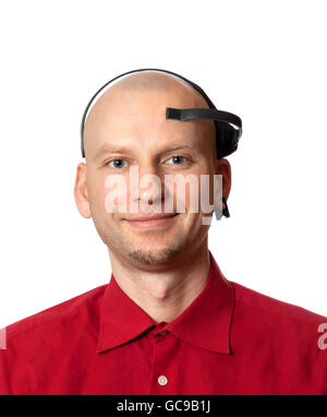 Portrait of young man with EEG (electroencephalography) headset on head. Isolated on white background. Stock Photo