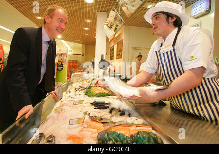 Pat McFadden, Minister for Business, Innovation and Skills (left) with Morrisons apprentice Tobias Morgan-Cavaha at a Morrisons supermarket in Chalk Farm, north west London, during the launch of Apprenticeship Week 2010. Stock Photo