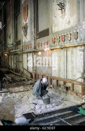 An archaeologist carries out restoration work inside St. George's Hall at Windsor Castle, which was gutted in the fire. Stock Photo