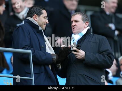 Soccer - Barclays Premier League - Manchester City v Portsmouth - City of Manchester Stadium. Manchester City Chairman Khaldoon Al Mubarak (left) and Executive Chairman Garry Cook (right) in the stands. Stock Photo