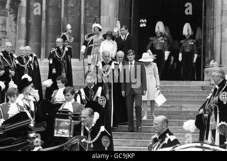 Prince Andrew, who returns to continue his schooling at Lakefield College, Ontario, Canada tomorrow, walks with Lord Mountbatten at Windsor Castle today after attending the installation service of the Most Noble Order of the Garter, at St. George's Chapel. Stock Photo