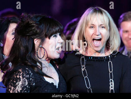 Coleen Nolan and Carol McGiffin (left to right) celebrate winning the award for Best Factual Programme at the National Television Awards 2010, at the 02 Arena, London. Stock Photo