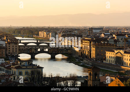 Ponte Vecchio over the Arno River at Sunset, Florence, Italy, Europe Stock Photo