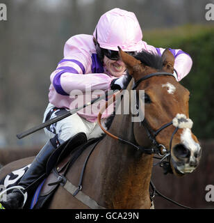 Jockey Tony McCoy in action, riding Tchico Polos during the totepool Challengers Novices Chase during the totesport Masters Day with Comedy at the Races Day at Sandown Racecourse, Surrey. Stock Photo