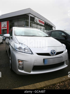 Toyota Prius. A Toyota Prius hybrid car on the forecourt of a Toyota dealer in Ashford, Kent. Stock Photo