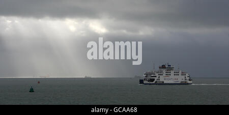 The Wightlink car ferry St Clare crosses The Solent before arriving in Portsmouth after making the crossing from Fishbourne on the Isle of Wight. Stock Photo