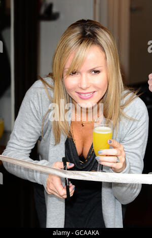 Amanda Holden opens beauty shop. Amanda Holden at the opening of Gina Hemmings' new health and beauty shop in Kew, west London. Stock Photo