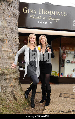 Amanda Holden (left) and Gina Hemmings at the opening of Gina Hemmings' new health and beauty shop in Kew, west London. Stock Photo