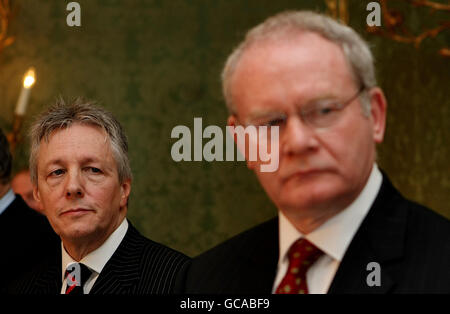 DUP leader Peter Robinson (left) and Sinn Fein's Martin McGuinness during a press conference after a deal was announced about Northern Ireland's power-sharing government. Stock Photo