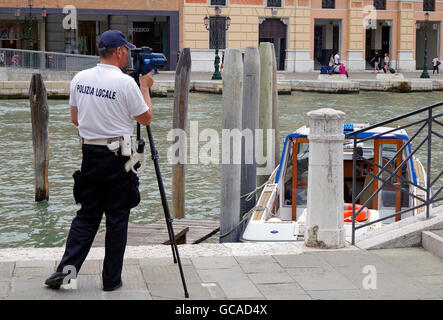 Venice, Italy, Policeman operating speed radar Stock Photo