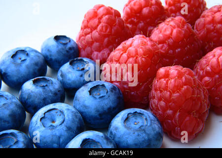 closeup of a bunch of blueberries and raspberries Stock Photo