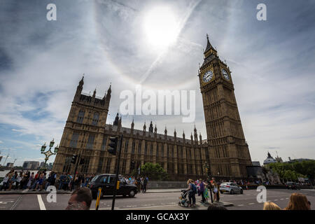 A solar halo seen over Westminster's Parliament buildings and Big Ben, London, UK. Stock Photo