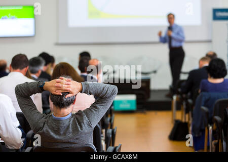Business man during a conference presentation Stock Photo
