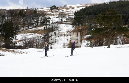 Skiers in Allenheads, Northumberland, which has been covered in snow for most of the winter. Stock Photo