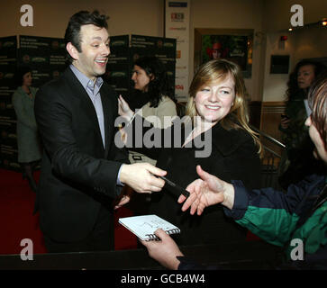 Michael Sheen signs autographs as he arrives for the screening of Alice in Wonderland at the Savoy Cinema in Dublin, part of the Jameson Dublin International Film Festival. Stock Photo