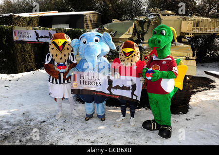 (left to right) West Bromwich Albion mascot Baggie Bird, Coventry City mascot Sky Blue Sam, West Bromwich Albion junior mascot Baggie Bird Junior and Northampton Town mascot Clarence The Dragon at the help for heroes tanks a lot day Stock Photo