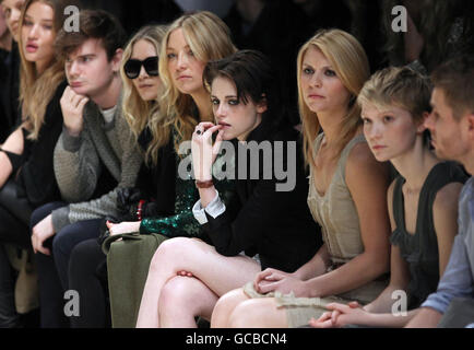 (left to right) Mary Kate Olsen, Kate Hudson, Kristen Stewart, Claire Danes and Mia Wasikowska attending the Autumn/Winter 2010 Burberry Prorsum show, at Chelsea College of Art and Design in central London. Stock Photo