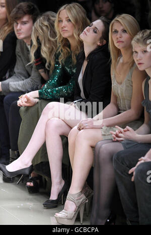 (left to right) Kate Hudson, Kristen Stewart, Claire Danes and Mia Wasikowska attending the Autumn/Winter 2010 Burberry Prorsum show, at Chelsea College of Art and Design in central London. Stock Photo