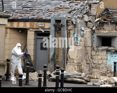 Police gather evidence, following a dissident car bomb attack outside Newry Courthouse in Co Down, shortly after 10.30pm on Monday. Stock Photo