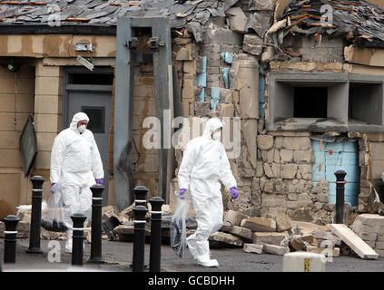 Police gather evidence, following a dissident car bomb attack outside Newry Courthouse in Co Down, shortly after 10.30pm on Monday. Stock Photo