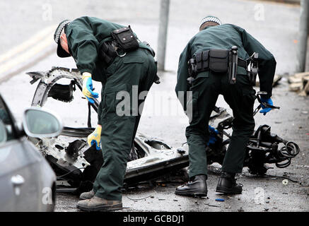 Police gather evidence, following a dissident car bomb attack outside Newry Courthouse in Co Down, shortly after 10.30pm on Monday. Stock Photo