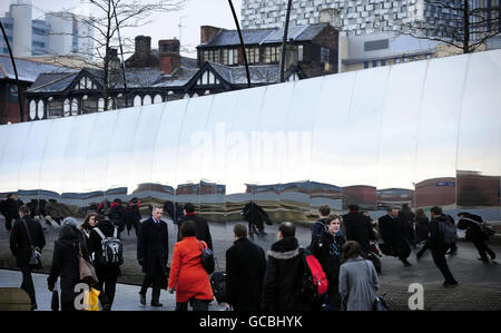 Sheffield, the city of steel, reflects its famous title in 'Cutting Edge', an 81 metre long sculpture made from mirror-polished stainless steel erected in Sheaf Square as part of the redevelopment of the city centre. Stock Photo
