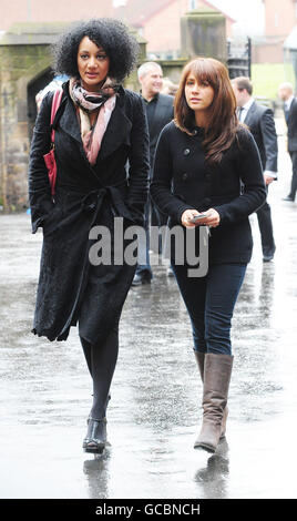 Tupele Dorgu (character name Kelly Crabtree) and Samia Smith (Maria Connor) arrive at the memorial service for the late Maggie Jones who played legendary Coronation Street battle-axe Blanche Hunt at Salford Cathedral, Manchester. Stock Photo