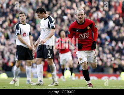 Soccer - Barclays Premier League - Manchester United v Fulham - Old Trafford. Manchester United's Wayne Rooney (right) celebrates scoring his second goal Stock Photo