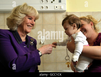 The Duchess of Cornwall with four-month-old Aida Turcsik and her mother Adrienn, at Semmelweis University's second department of paediatrics in Budapest Hungary, this morning. Stock Photo