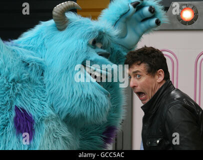 Shane Richie with a person in costume as the character Sulley from Monsters Inc at the New Generation Festival launch event at Disneyland Paris. Stock Photo