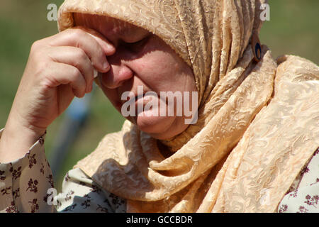 Visoko, Bosnia and Herzegovina. 9th July, 2016. ADILA SULJIC is seen crying at a morgue in the central Bosnian town of Visoko. In one of the coffins there is one bone of her husband who was killed in the massacre in Srebrenica. Credit:  Armin Durgut/ZUMA Wire/Alamy Live News Stock Photo