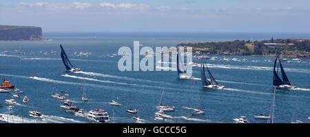 Sydney, Australia - December 26, 2014. Comanche is leading. The Sydney to Hobart Yacht Race is an annual event, starting in Sydney on Boxing Day and finishing in Hobart. Stock Photo