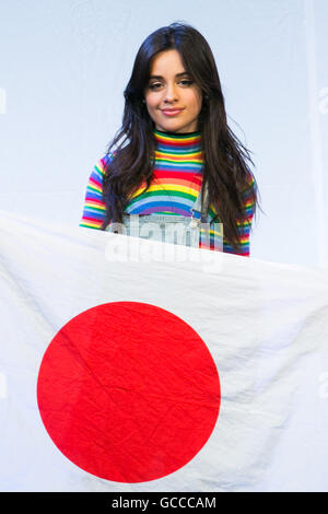 Tokyo, Japan. 9th July, 2016. Camila Cabello, a member of the American five-piece girl group Fifth Harmony holds a Japanese flag during a fan event on July 9, 2016, in Tokyo, Japan. Fifth Harmony is in Japan for the first time to promote their new song Work from Home after finishing their South American tour. Credit:  Rodrigo Reyes Marin/AFLO/Alamy Live News Stock Photo