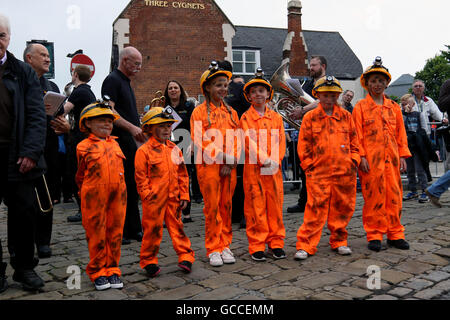Durham, UK. 9th July, 2016. Youth dressed as miners pose for the cameras. 2016 Miners Gala Credit: Dan Cooke/Alamy Live News Stock Photo