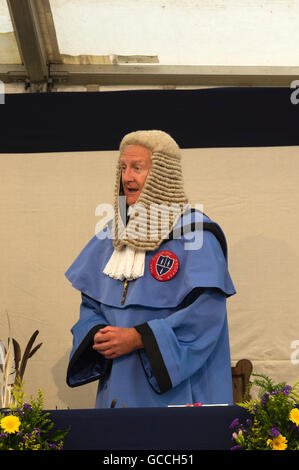 Dunmow Essex Uk. Flitch trials.  This event goes back to Anglo Saxon times and is held every 4 years.  Married couples appear before a mock court  to show that they have never quarrelled.  Succesfulcouples are awarded a flitch of bacon.  Mr Monk started his career as a solicitor.  Here he is in the flitch court Stock Photo