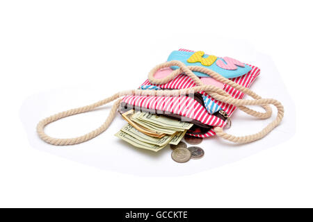 Money coming out of girl hand bag. Stock Photo