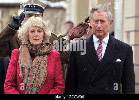 The Prince of Wales and the Duchess of Cornwall, stand for a one minute silence at the Grave of Father Jerzy Popieluszko, in Warsaw Poland, after arriving in the country earlier, this afternoon.