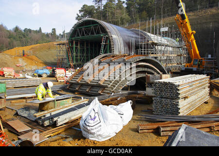Construction underway on the north bound portal of the A3 at Hindhead in Surrey where engineers are close to completing a pair of road tunnels under the Devil's Punch Bowl. Stock Photo