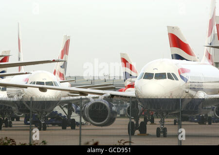 British Airways' planes sit on the tarmac at Heathrow Airport in Middlesex as British Airways cabin crew continued with a strike over cost-cutting. Stock Photo