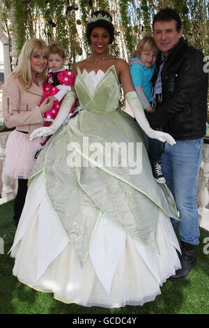 Shane Richie (right) with son Mackenzie Blue and wife Christie Goddard (left) with daughter Lolita Bell with Princess Tiana (centre) from The Princess and The Frog at the New Generation Festival launch event at Disneyland Paris. Stock Photo