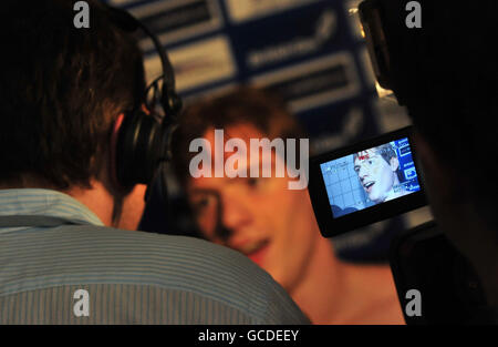 Stockport Metro's Michael Rock is interviewed by the media after winning the men's open 200m Butterfly during the British Swimming Championships at Ponds Forge, Sheffield. Stock Photo