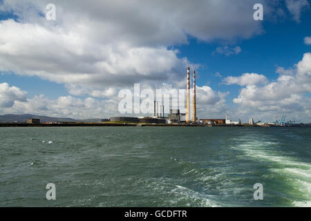 The Poolbeg chimneys viewed from a boat in Dublin bay, Dublin, Ireland Stock Photo