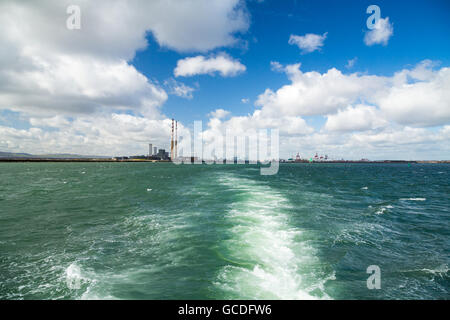 The Poolbeg chimneys viewed from a boat in Dublin bay, Dublin, Ireland Stock Photo