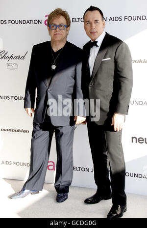 Sir Elton John and David Furnish arriving for The 18th annual Elton John AIDS Foundation Party to celebrate the 82nd Academy Awards at the Pacific Design Center in Los Angeles. Stock Photo