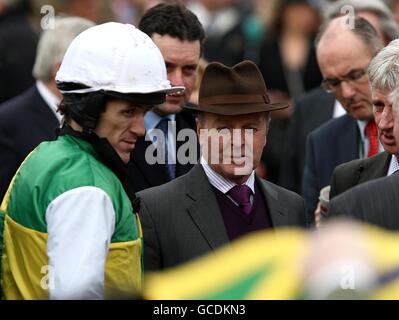 Horse Racing - 2010 Cheltenham Festival - Day Three. Tony McCoy (left) with trainer Jonjo O'Neill after winning the Ryanair Chase (Registered As The Festival Trophy Chase) on Albertas Run Stock Photo
