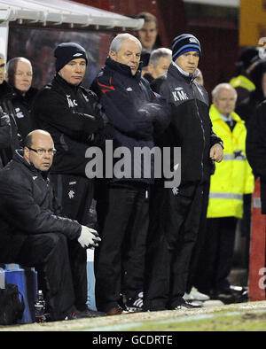 (left to right) Rangers coach Ally McCoist, manager Walter Smith and Kenny McDowall on the touchline Stock Photo